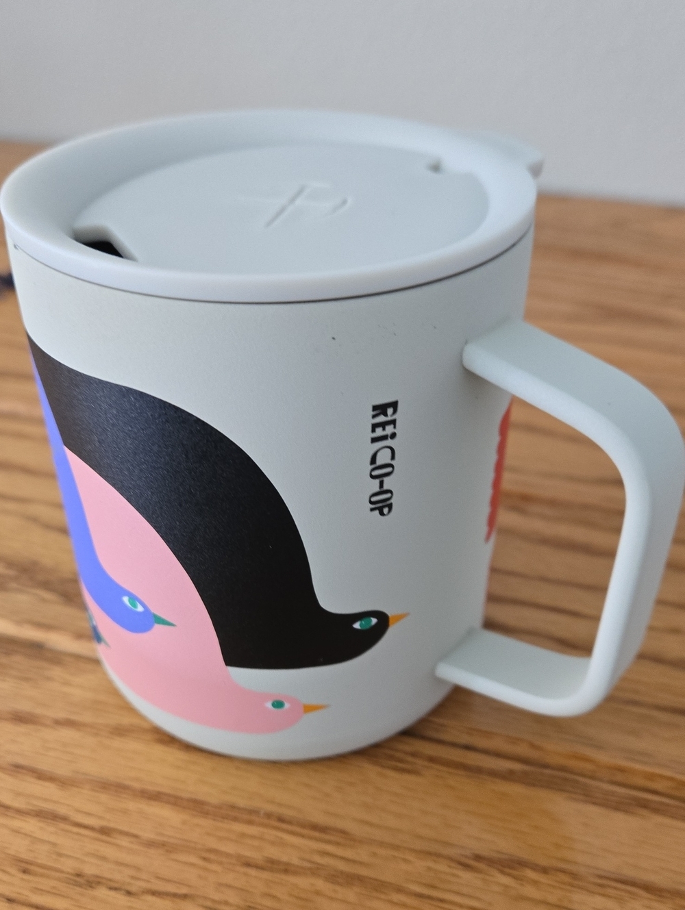 REI Co-op Light Gray Travel Mug with Pink and Black Bird Design